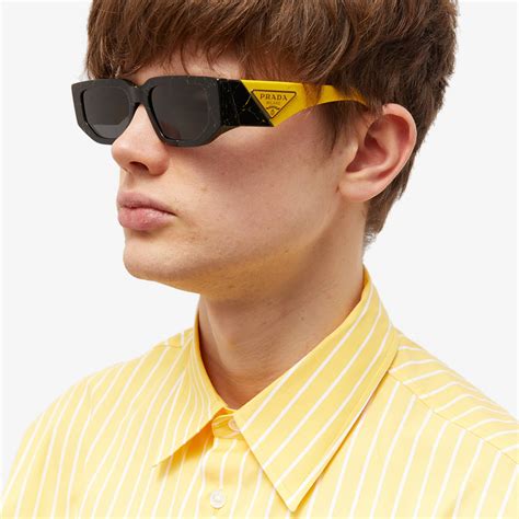 prada lunette soleil|Prada black and yellow sunglasses.